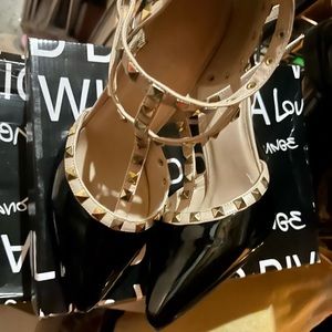 Black and beige studded heels, like new.